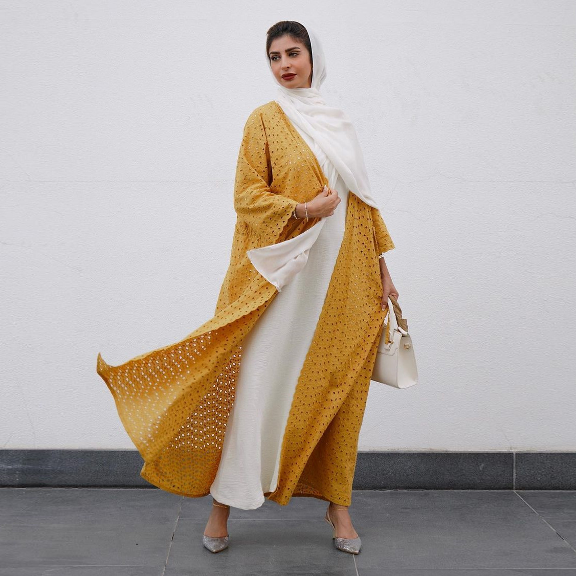 Jalabiya Step into sophistication with a pure cotton jalabiya set | featuring a breezy crochet outer jacket and a white inner layer | a fashionable cardigan style | and a touch of minimalist refinement