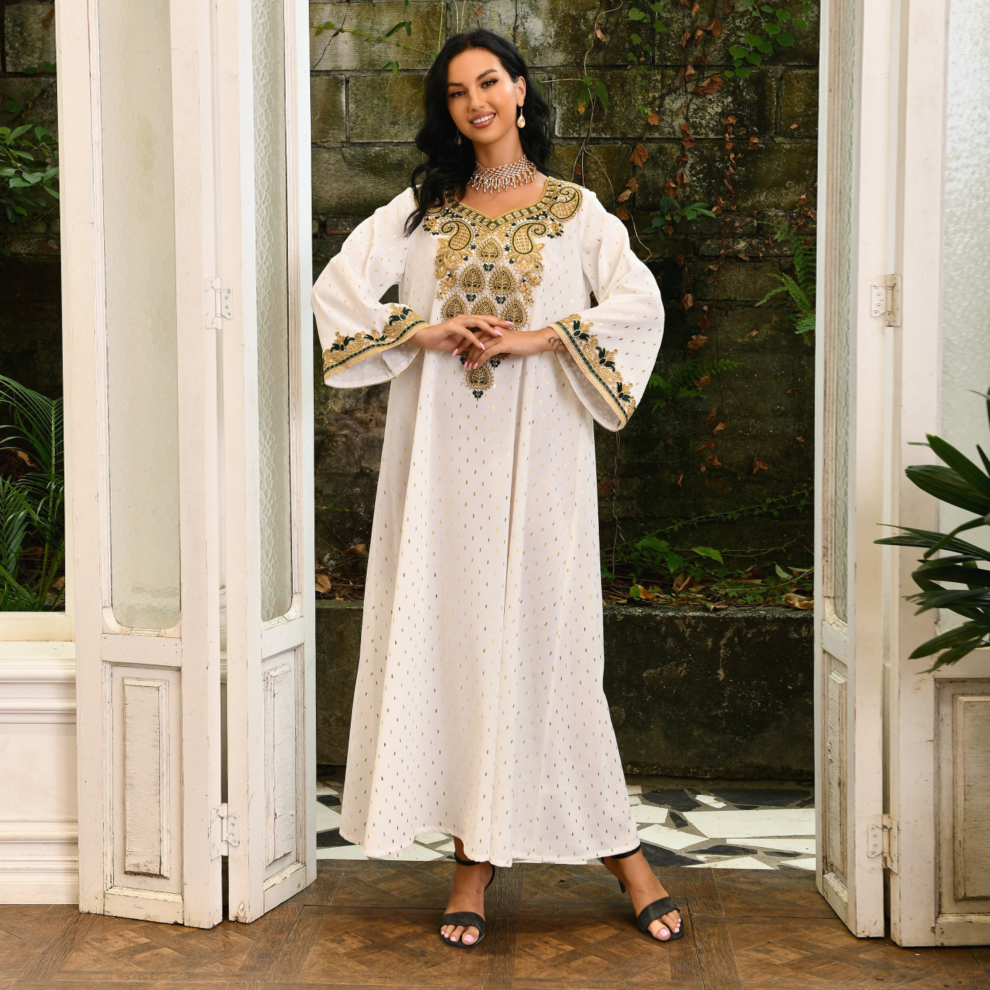 Jalabiya Discover the essence of understated elegance with a jalabiya | adorned with delicate lace | gold foil accents | embroidered appliques | and a minimalist allure