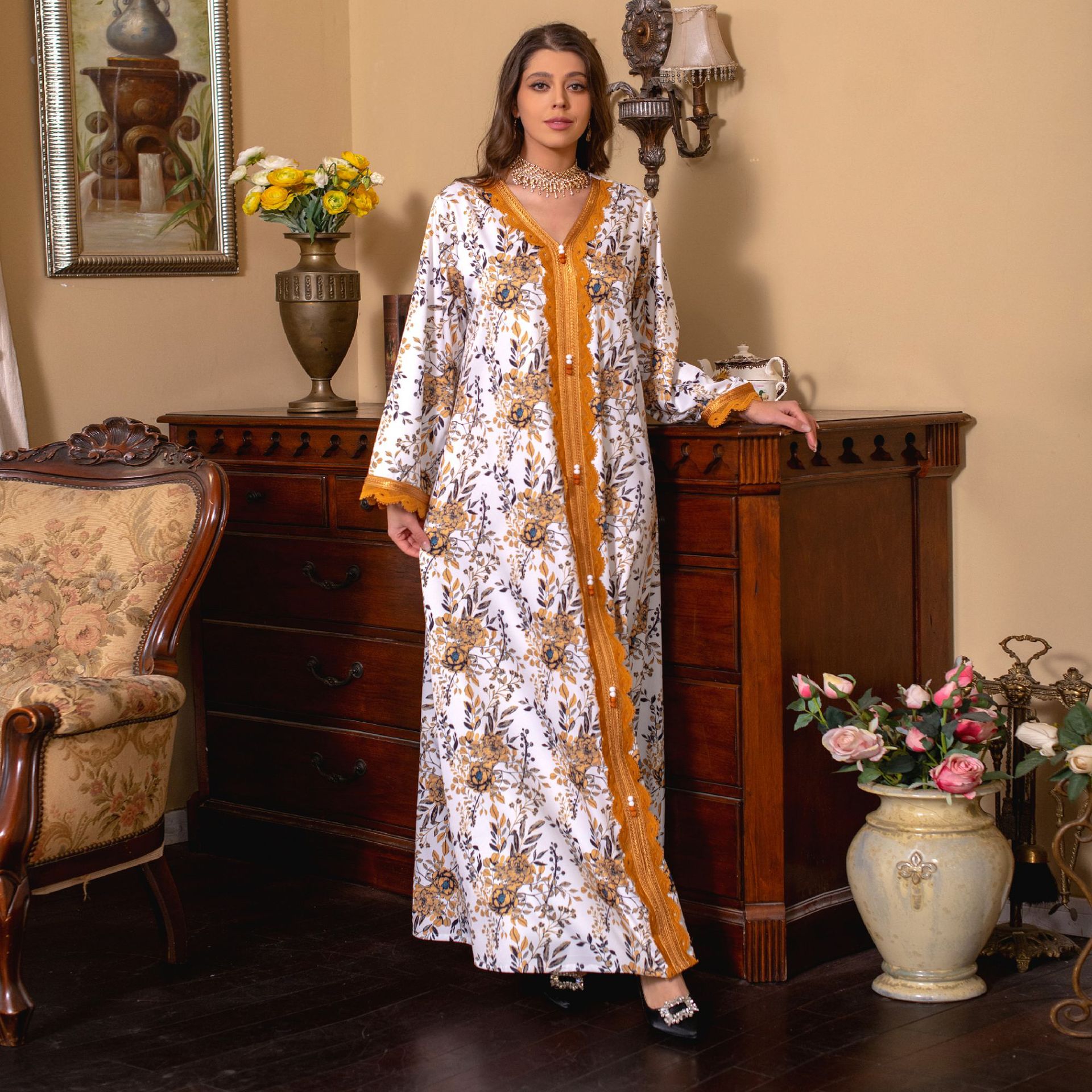 Jalabiya Immerse yourself in the comfort of a printed jalabiya | featuring a relaxed, flowy silhouette | intricate lace trimmings | and a casual yet stylish design