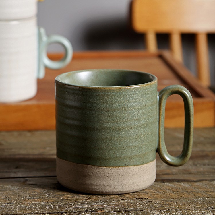 Simple and rustic ceramic coffee cup with textured stripes for home use